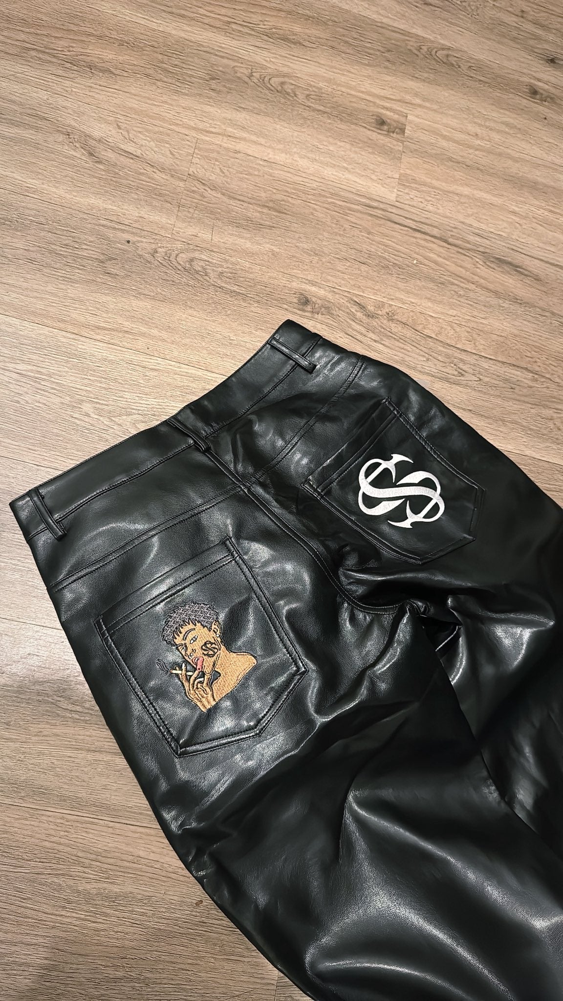 Black leather jorts